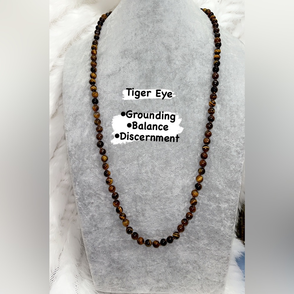 Introducing the Chakra Tiger Eye Necklace, your ultimate spiritual companion! 🐅